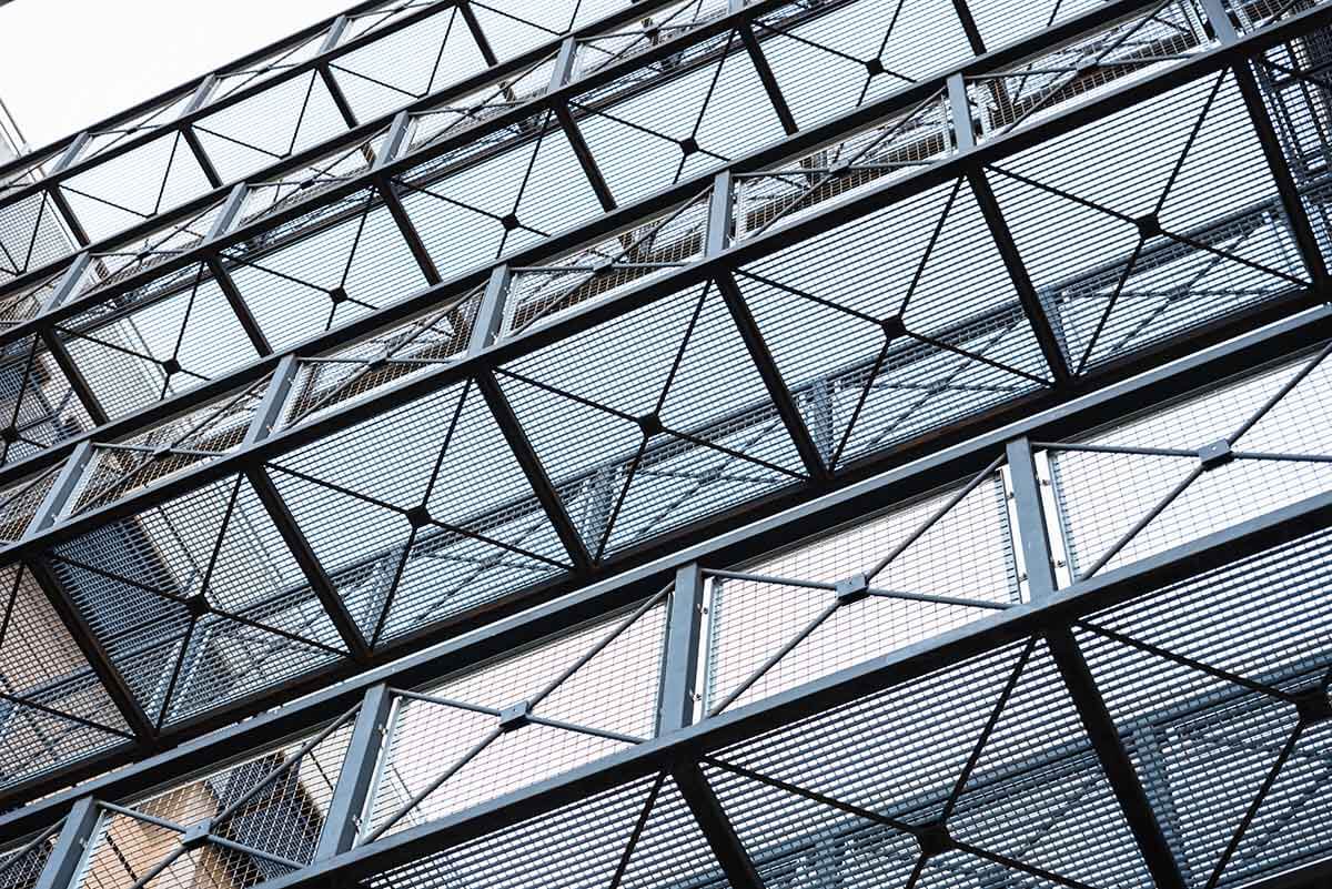 metal-mesh-on-steel-walkways-between-buildings-to-2022-05-03-22-34-19-utc-copy.jpg