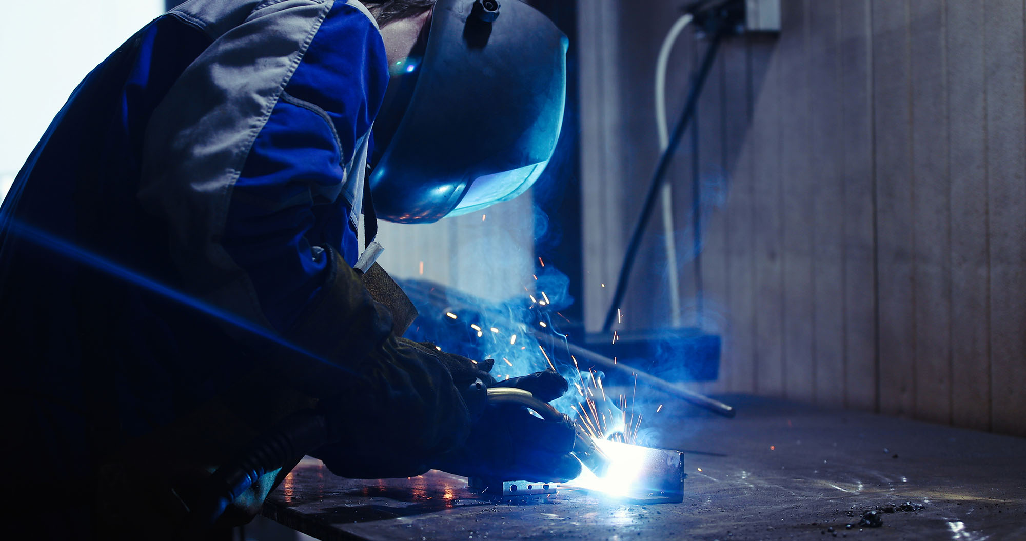 metal-worker-welding-in-metal-industry-factory-2021-08-26-17-30-19-utc-copy.jpg